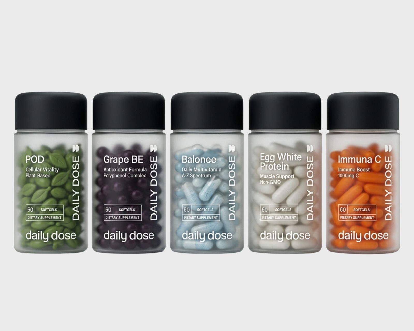 Five DailyDose bottles in a row, each a different colour