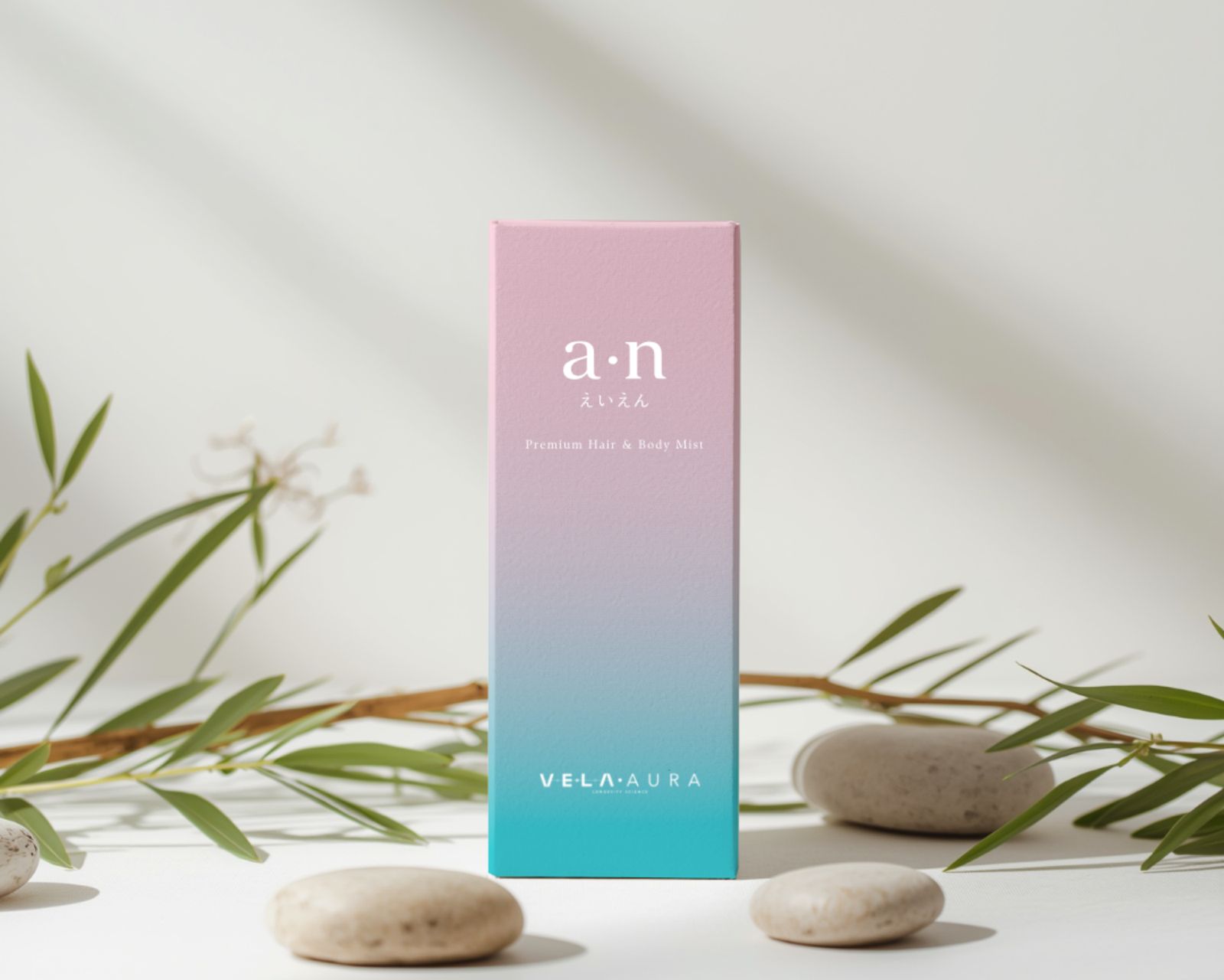 VE•LA Aura a·n hair and body mist in a pink-to-aqua gradient box